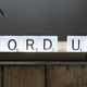 Illustration for article titled You Can Rearrange the Letters and Spell Out Any Message On This Scrabble Tile Rack Lamp